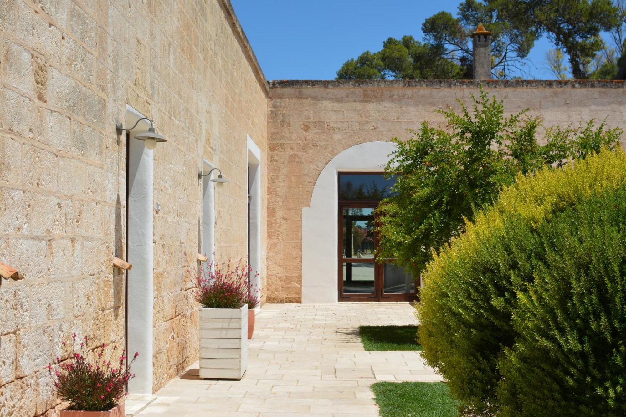 Masseria Corda Di Lana Hotel & Resort Torre Lapillo Bagian luar foto